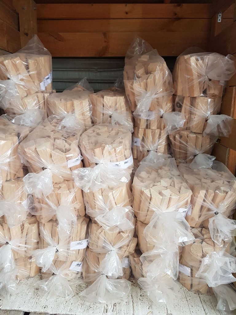 Bags of kindling for firewood upsell